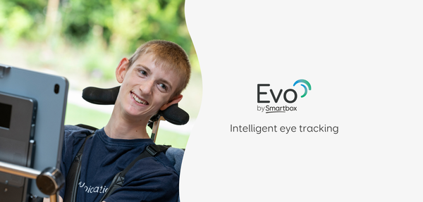 Young person using eye-tracking technology on a communication device.