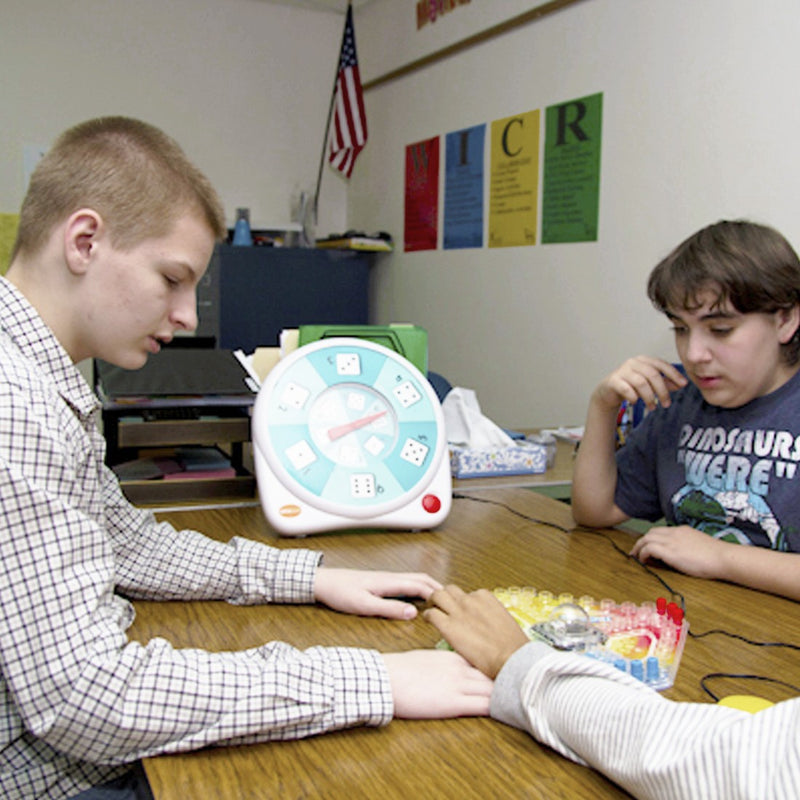 Kids using All Turn It Spinner